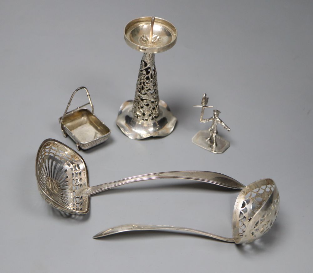 Two Dutch white metal sifter spoons, a Chinese white metal vase (base missing0 and two toy items, Dutch & Chinese.